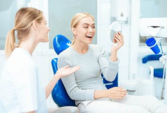 patient smiling during cosmetic consultation