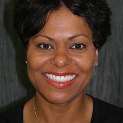 Woman with healthy smile after dental checkup