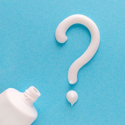 Question mark written with toothpaste