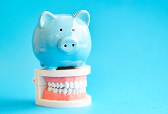 piggy bank with teeth