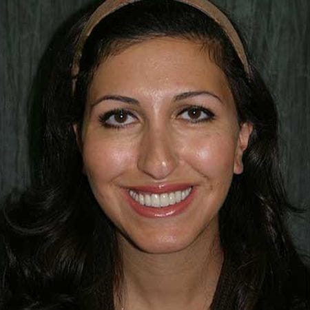 Woman with healthy smile after periodontal therapy