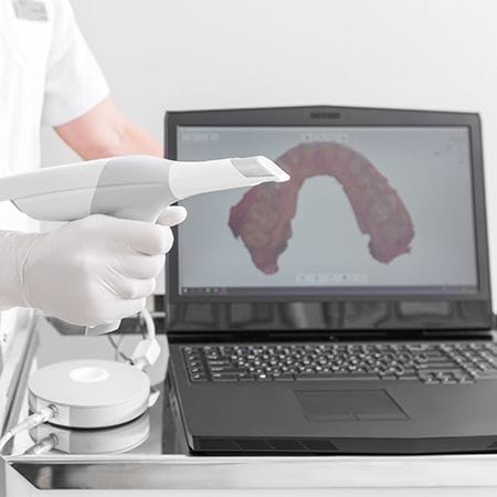 Jaw and bite scans used during T M J therapy planning