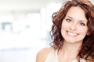 happy woman smiling with perfect teeth