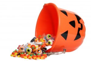 Jack-o'-lantern bucket full of candy.
