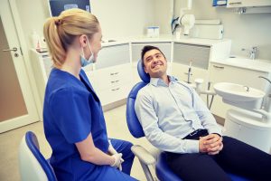 man and dental assistant in the office 