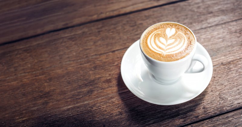 a tabletop with hot coffee