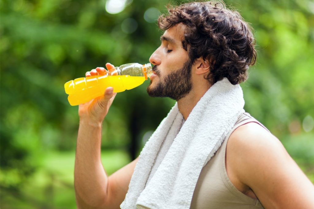 Man drinking sports drink