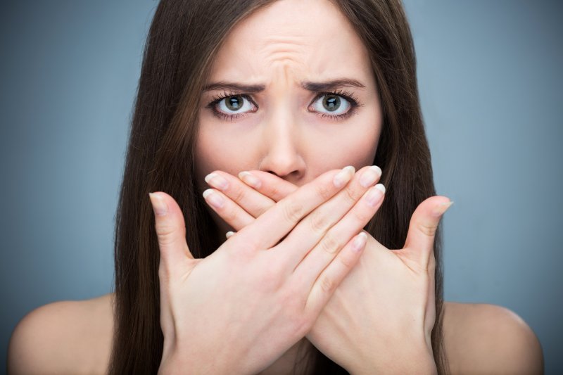 Woman embarrassed at the dentist