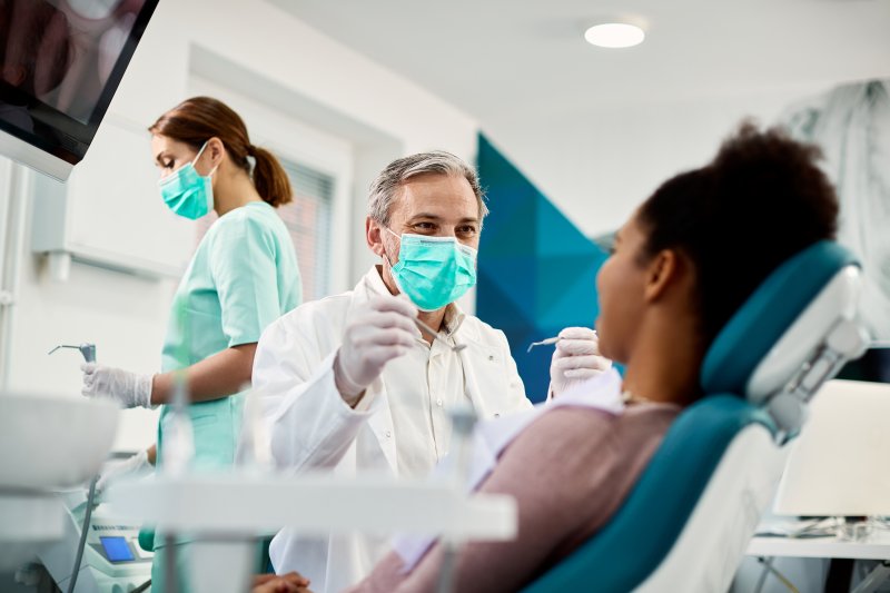 patient sitting in their dental chair