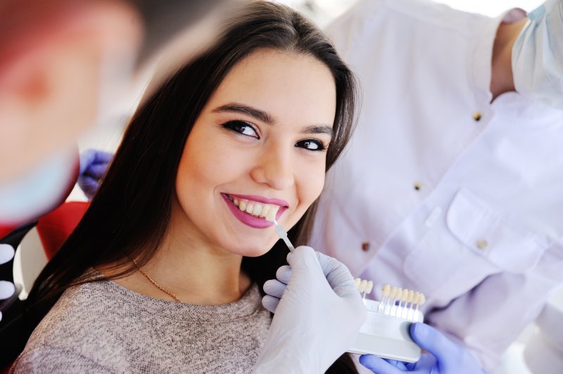 A woman getting a veneer treatment