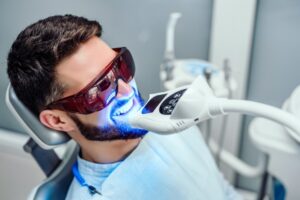 Patient having his teeth whitened professionally.